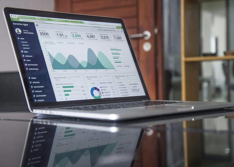 A laptop showing a data dashboard